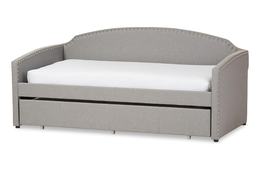 baxton studio lanny modern and contemporary grey fabric nail heads trimmed arched back sofa twin daybed with roll out trundle guest bed | Modish Furniture Store-2