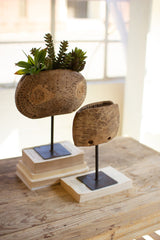 Repurposed Wooden Cow Bell Planters On Iron Stands By Kalalou